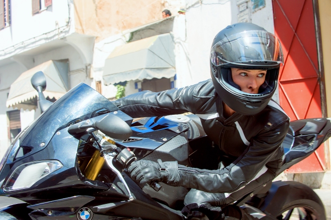 Rebecca Ferguson on motorcycle in Mission: Impossible - Rogue Nation
