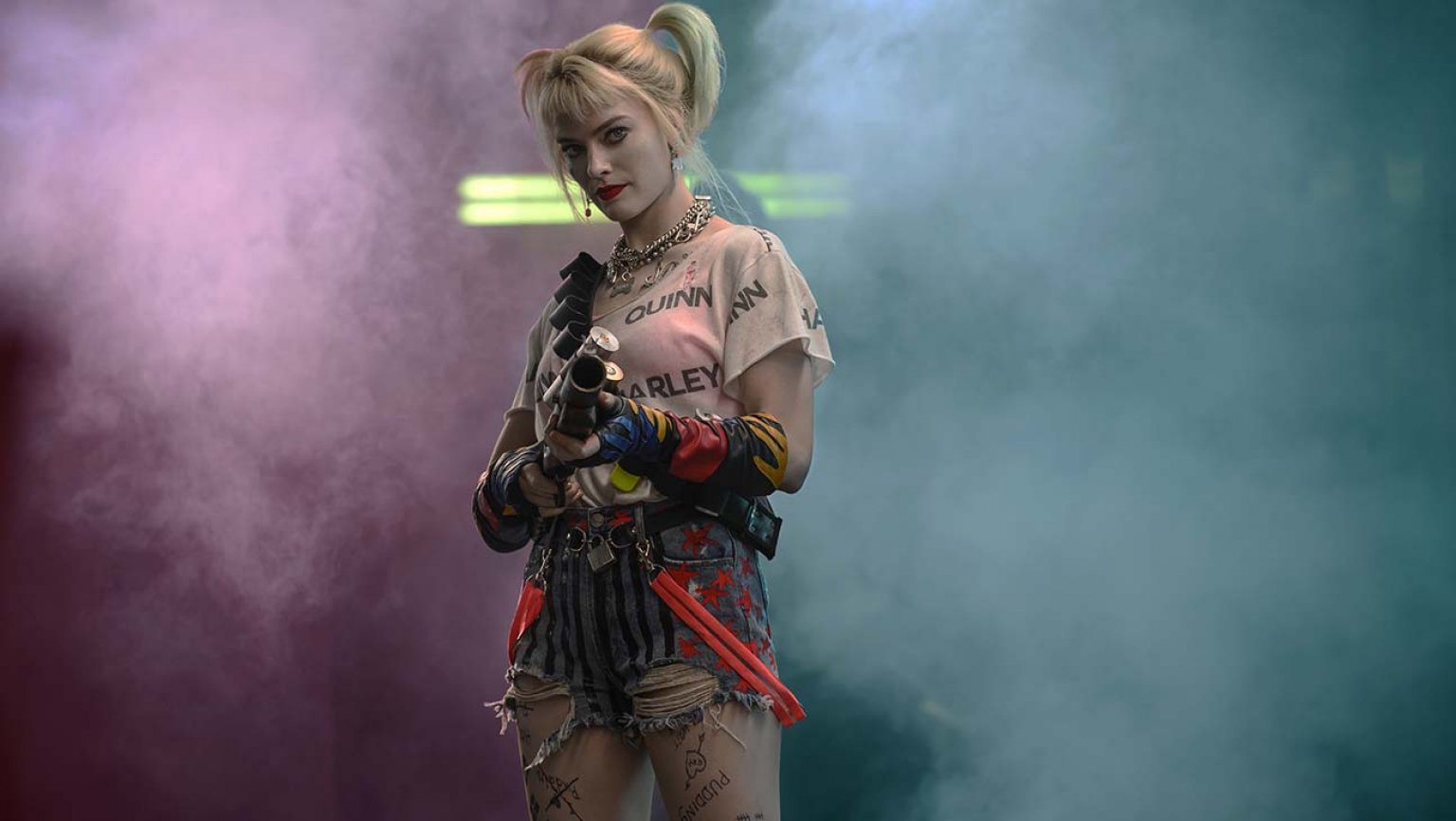 Margot Robbie holds grenade launcher in Birds of Prey