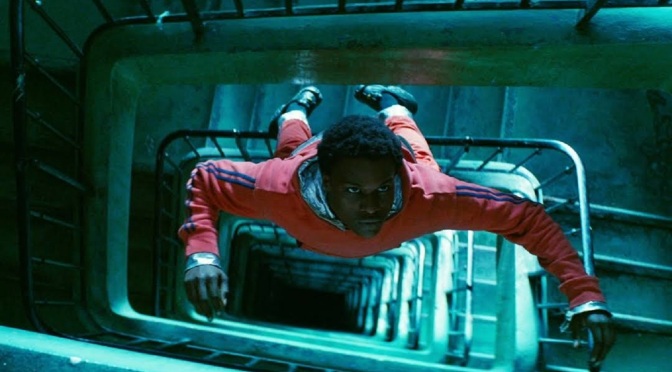 Alseni Bathily's Youri floats up a staircase in French film "Gagarine".